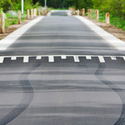 Maximizing Parking Lot Efficiency: 5 Advantages of Installing Rubber Speed Bumps