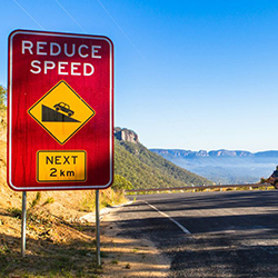 Improving Road Safety through Slower Speeds